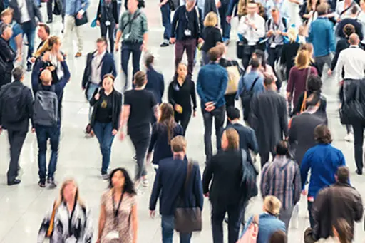 business people crowd at a tradeshow, banner size. ideal for websites and magazines layouts