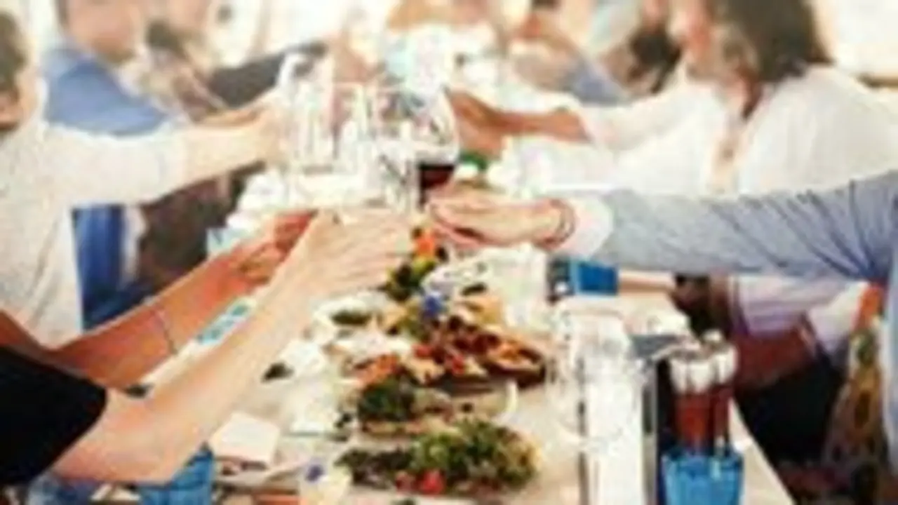 People cheering each other with champagne and wine. Party Celebration Success Concept